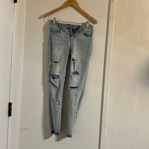 “Ripped” skinny jeans - high waisted